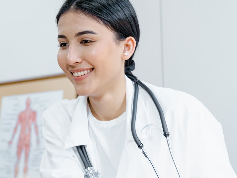 A clinician reviewing patient health information